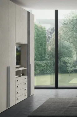 Armadio 6 ante battenti Yuri con vano Tv e 4 cassetti linea Lotto disponibile in 21 colorazioni