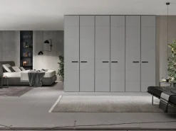 Armadio battente componibile con ante rivestite in ecopelle e maniglia integrata disponibile in varie misure e colori