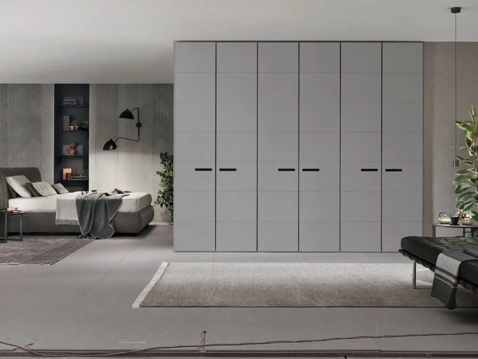 Armadio battente componibile con ante rivestite in ecopelle e maniglia integrata disponibile in varie misure e colori