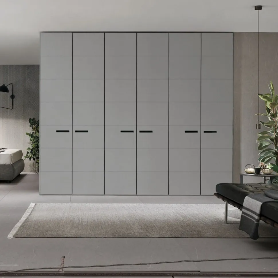 Armadio battente componibile con ante rivestite in ecopelle e maniglia integrata disponibile in varie misure e colori
