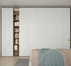 Armadio con maniglia a tutta altezza con ante battenti e libreria disponibile in 2 misure