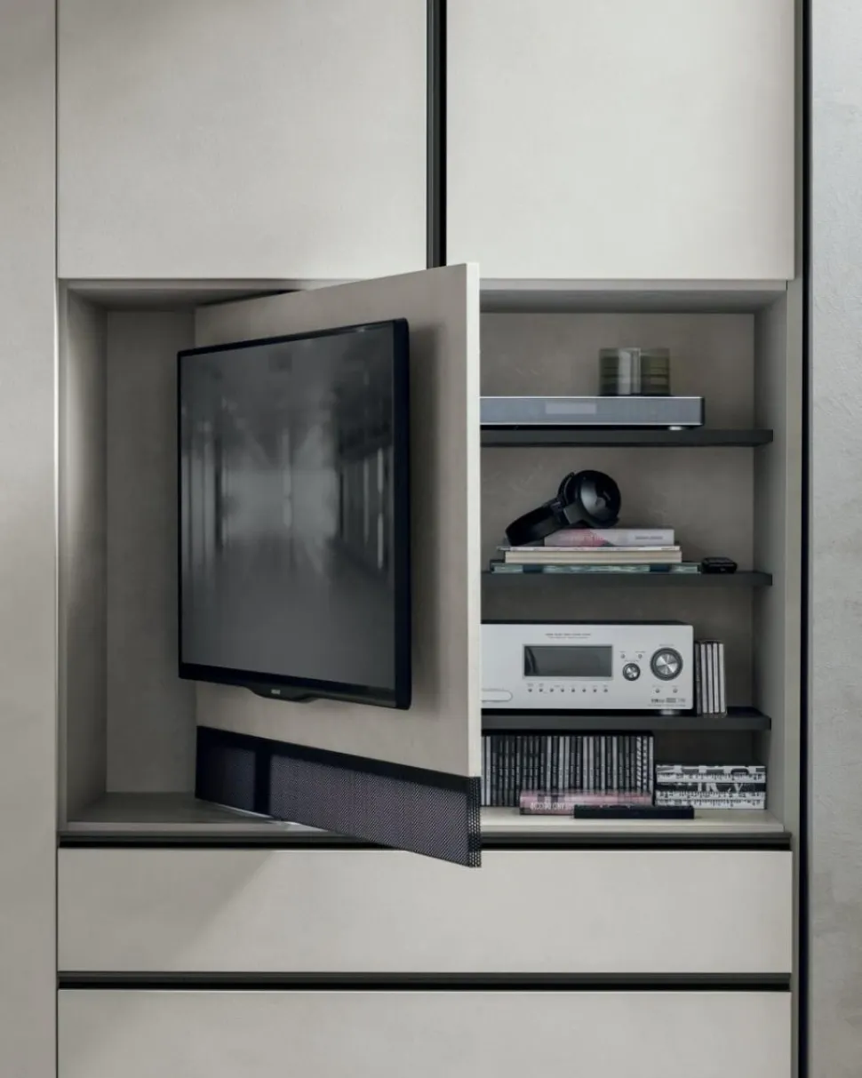 Armadio modulare componibile con vano TV girevole ante battenti e cassetti con maniglia a gola integrata tutta altezza disponibile in vari colori