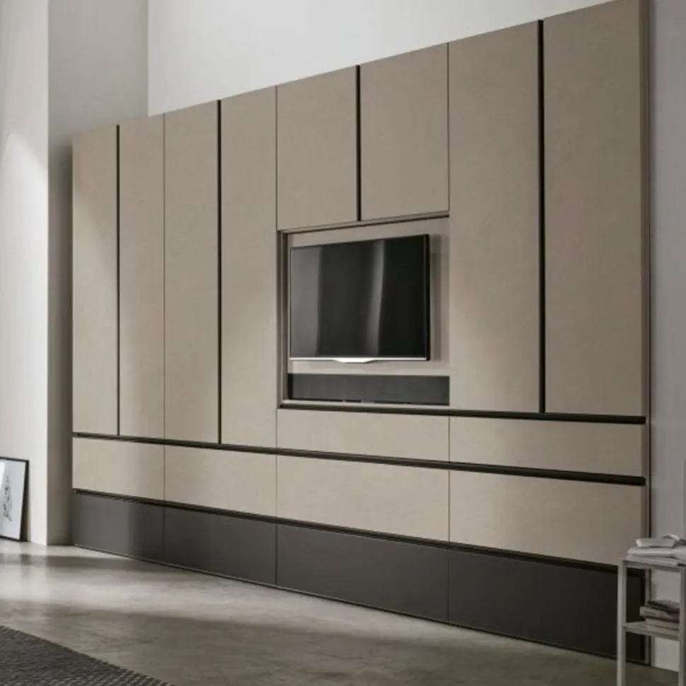 Armadio modulare componibile con vano TV girevole ante battenti e cassetti con maniglia a tutta altezza integrata disponibile in vari colori