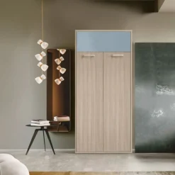 Letto a scomparsa verticale trasformabile in Olmo e Azzurro disponibile in 2 misure