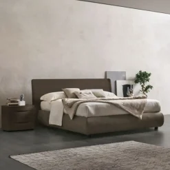 Letto contenitore con testiera curva e giroletto imbottito matrimoniale Ronald disponibile in 2 misure e vari colori