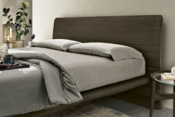 Letto con testiera curva matrimoniale Ronald disponibile in 2 misure e vari colori