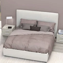 Letto matrimoniale imbottito in tessuto Apollo disponibile in vari colori