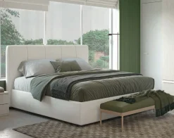 Letto matrimoniale imbottito in tessuto Apollo disponibile in vari colori