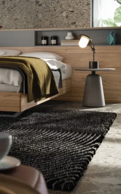 Letto matrimoniale moderno con testiera con vani contenitore disponibile in vari colori