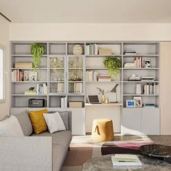 Libreria modulare con scrivania integrata e ante in vetro disponibile in vari colori