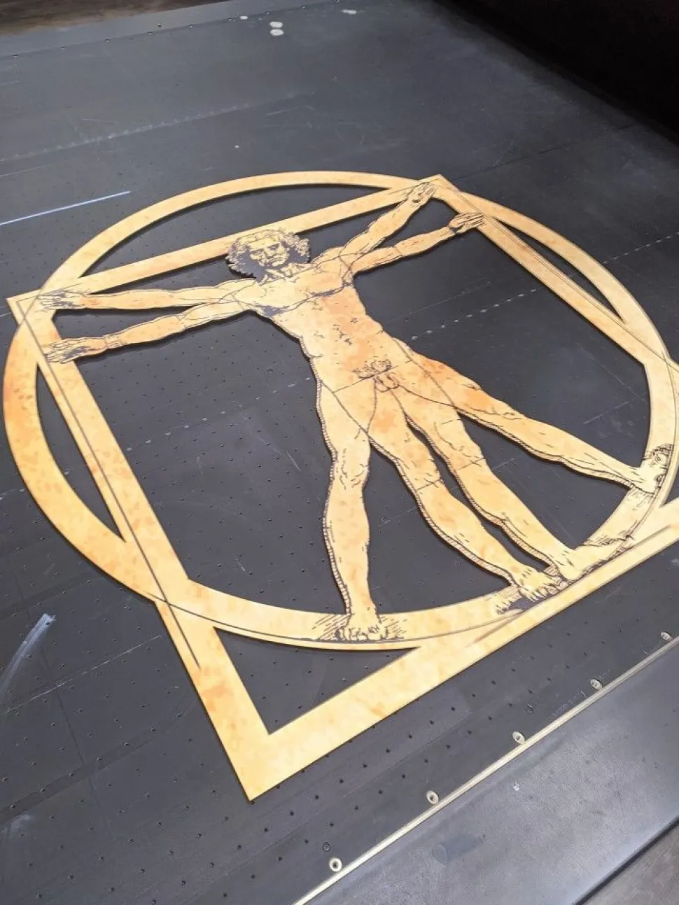 Quadro in legno chiaro Uomo Vituviano diamentro 1 metro