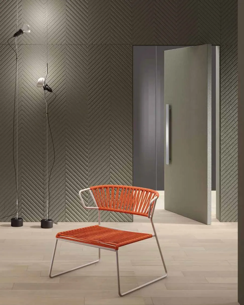 Sedia con struttura a slitta in acciaio tubolare e seduta in PVC Acquamarina