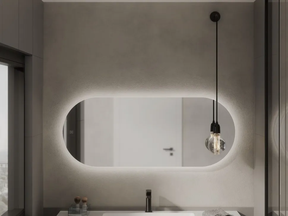 Specchio ovale reversibile con sabbiatura perimetrale retroilluminata