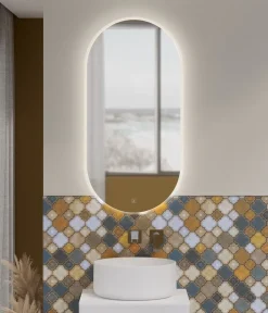 Specchio ovale reversibile con sabbiatura perimetrale retroilluminata