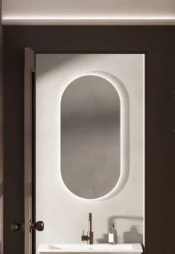 Specchio ovale reversibile con sabbiatura perimetrale retroilluminata