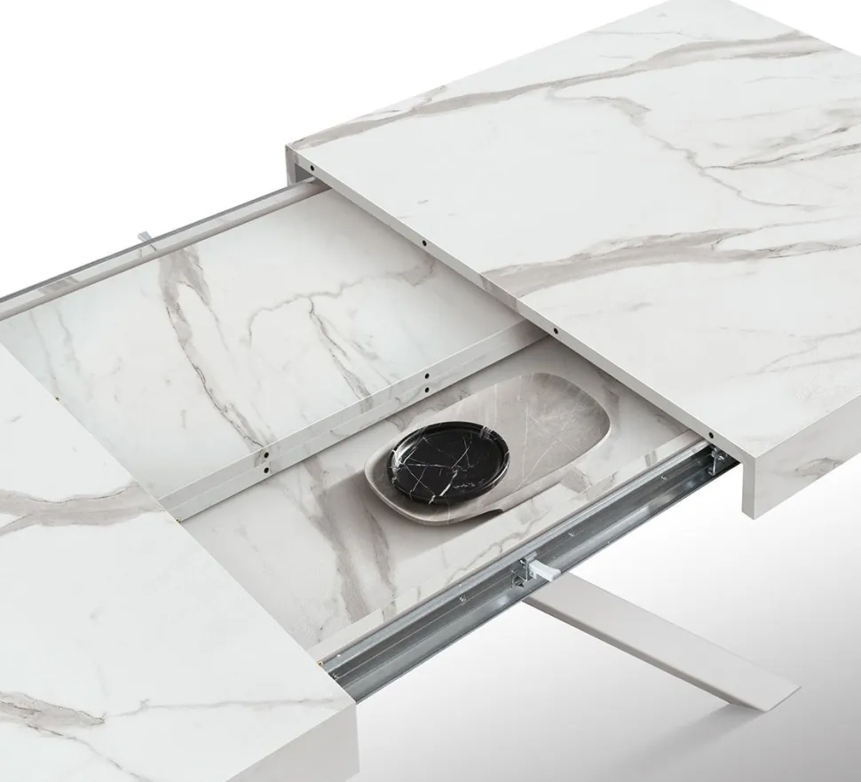 Tavolo allungabile con base a stella in metallo e piano in nobilitato Marmo Bianco Statuario