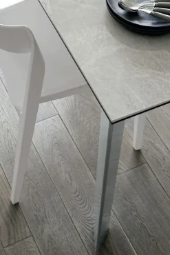Tavolo allungabile rettangolare con piano in Gres Saturno finitura Arabescato L 130