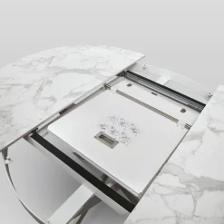 Tavolo rotondo allungabile con struttura in metallo e piano opaco in ceramica Abbraccio