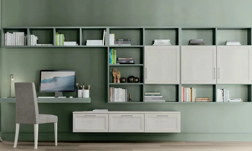 Zona studio attrezzata moderna con scrivania sospesa linea Omega disponibile in vari colori