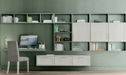 Zona studio attrezzata moderna con scrivania sospesa linea Omega disponibile in vari colori